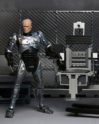 Ultimate battle damaged Robocop with chair figure 18cm ( Daño en caja )