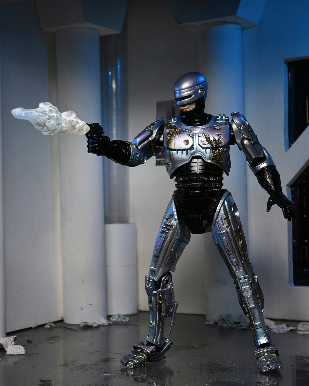 Ultimate battle damaged Robocop with chair figure 18cm ( Daño en caja )